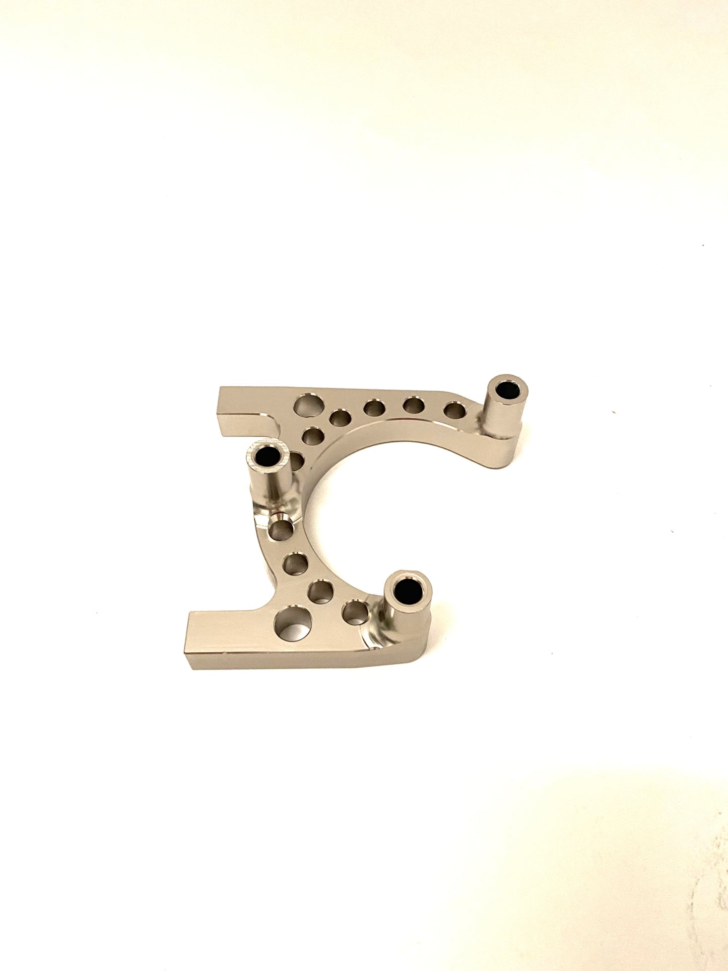 REAR BRAKE CALIPER SUPPORT